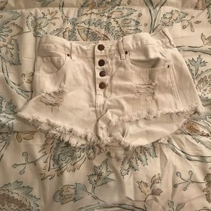 White “skinny” shorts